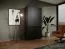 Kleiderschrank Bainton 02, Farbe: Schwarz, 200 x 101 x 51 cm, 6 Fächer, 2 Kleiderstangen, viel Stauraum, elegantes Design, langlebig