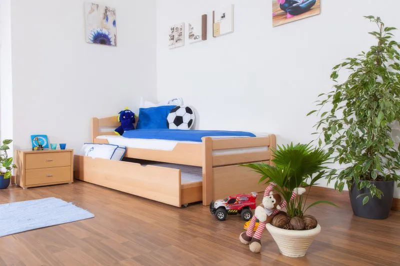 Kinderbett / Jugendbett "Easy Premium Line" K1/2h inkl. 2. Liegeplatz und 2 Abdeckblenden, 90 x 200 cm Buche Vollholz massiv Natur