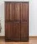 Kleiderschrank | 3 Drehtüren | 4 Fächer | mit Kleiderstange | 120 cm breit | Massivholz | Farbe: Nuss Abbildung